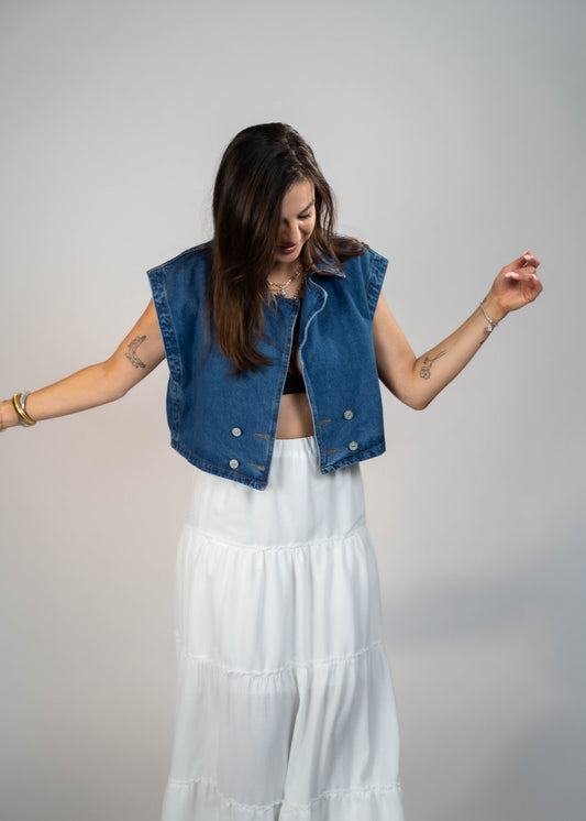 Blue loose-fit denim vest with structured shoulders, perfect for adding a relaxed and casual touch to any outfit