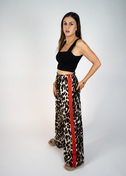 leopard pants with red stripes on the side 